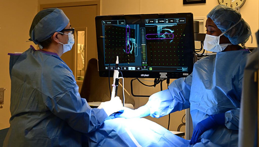 Dr. Katherine Hsiao, left, with Sutter Pacific Medical Foundation watches...